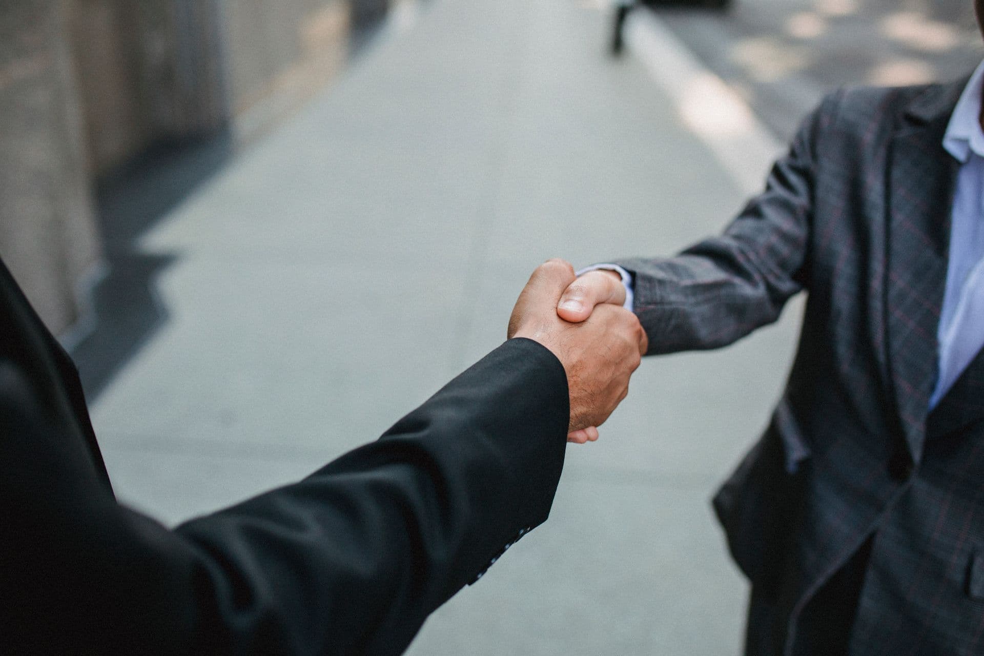 Two lawyers shaking hands